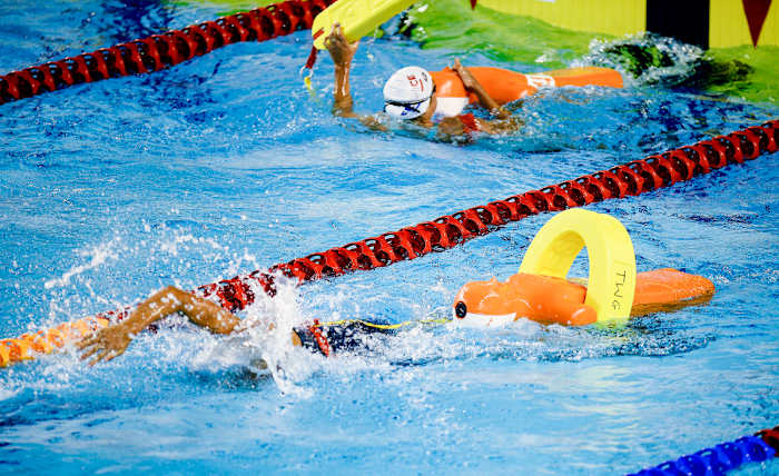 Once dummies are rescued from the bottom of the pool, they’re attached to rescue tubes and towed.